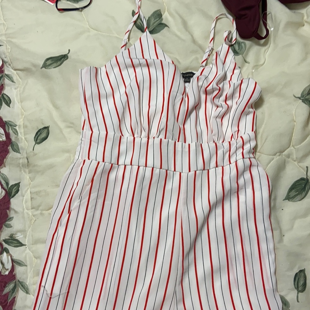 Red white black striped jump suit